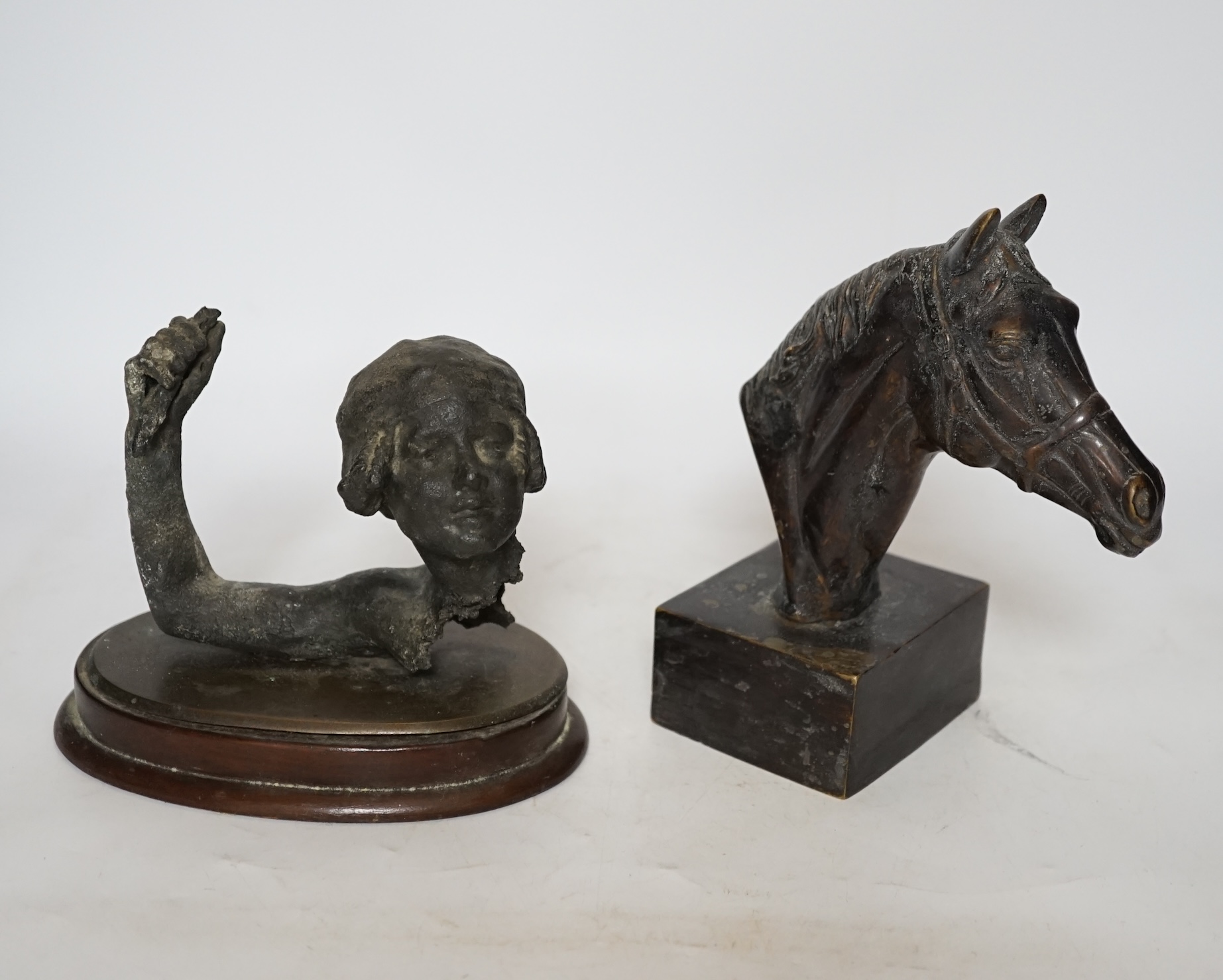 A decorative bronze study of a horse head and a spelter figural fragment, tallest 18.5cm